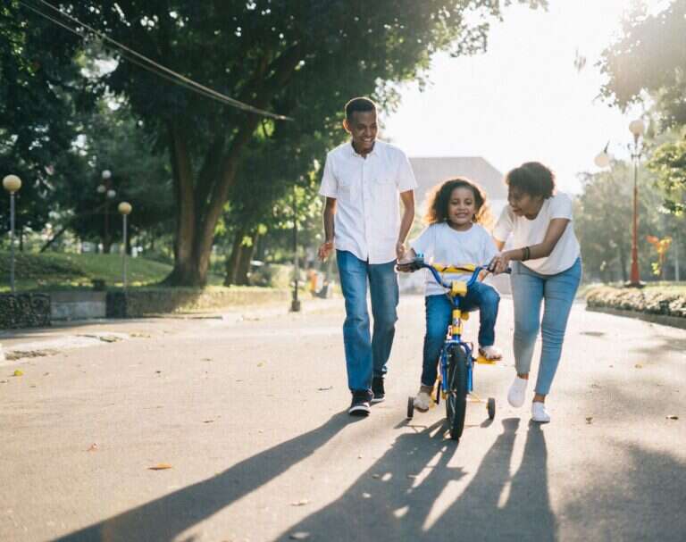 Parents with children spending time together at home